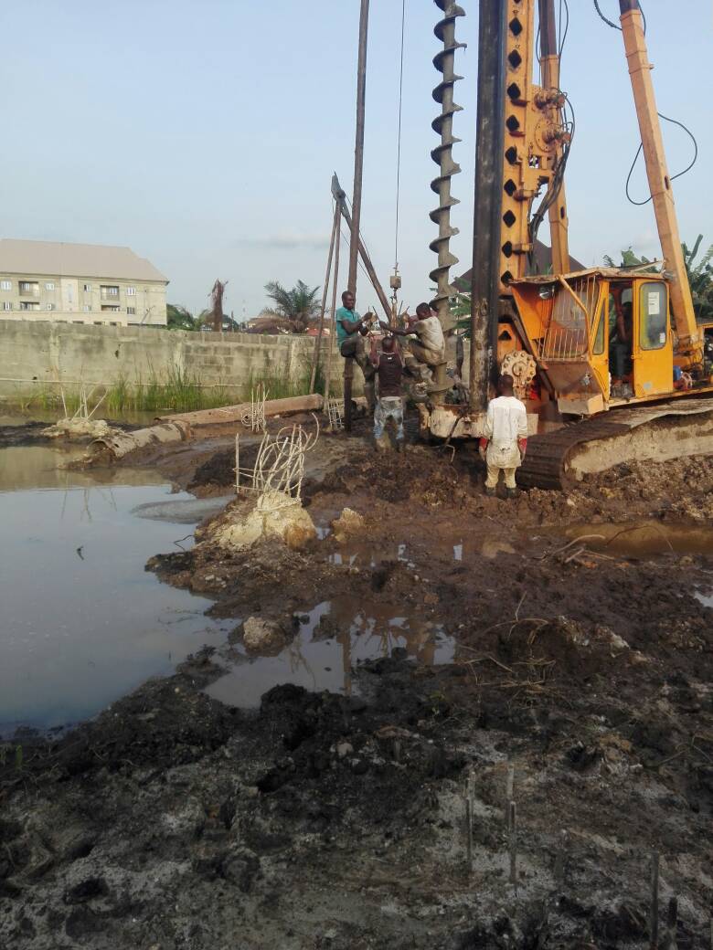 GTGABOD site engineer supervising a piling rig during foundation works