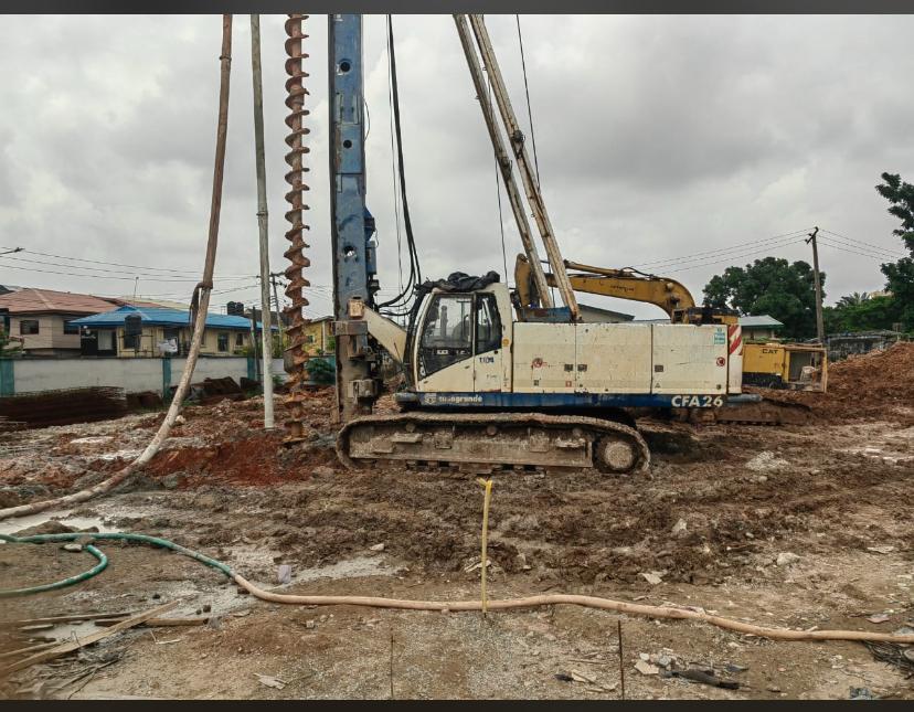 Soilmec CFA26 continuous flight auger piling rig on a cleared urban plot